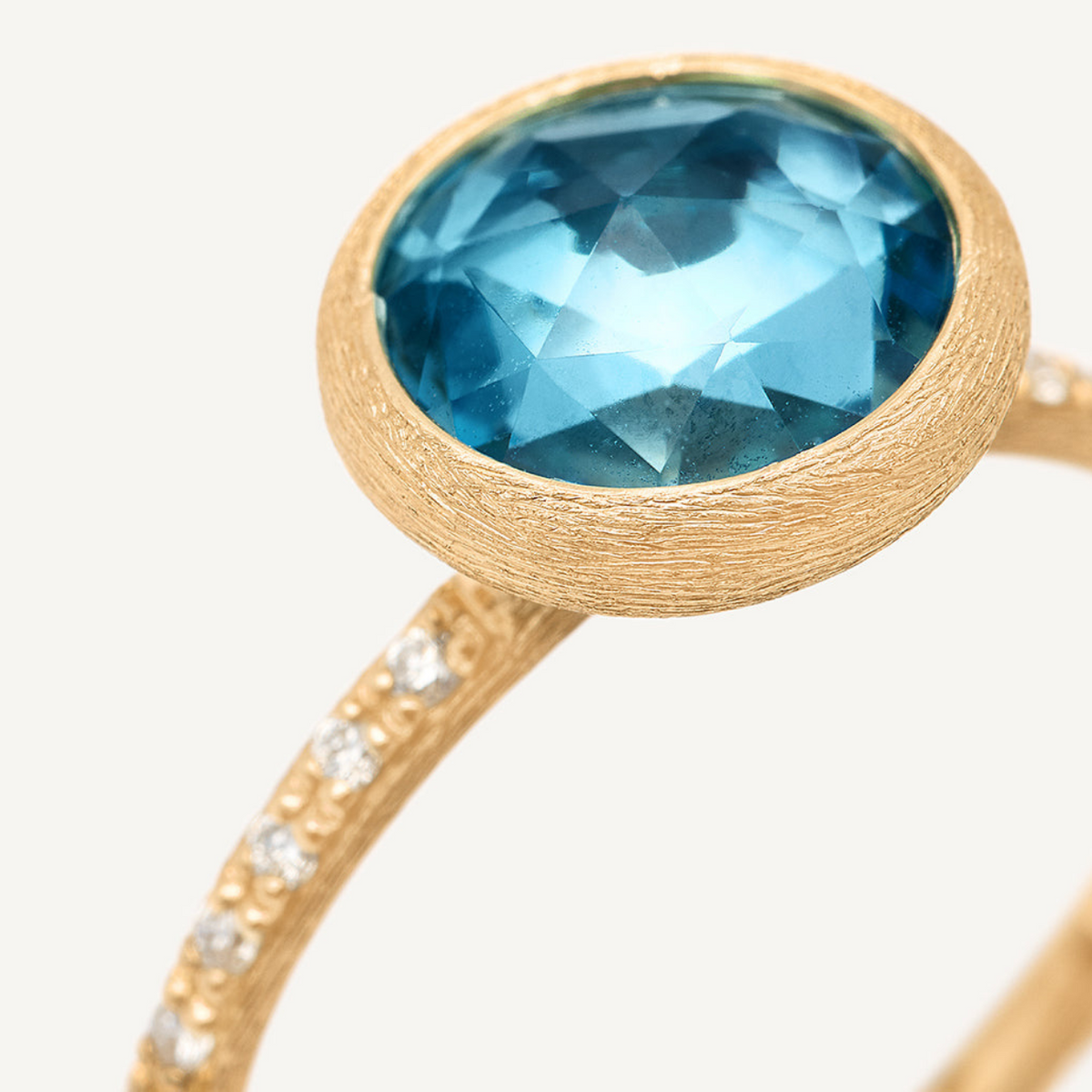 Marco Bicego Jewelry - Jaipur Color 18K Yellow Gold Blue Topaz with Diamond Pavé Shank Ring | Manfredi Jewels