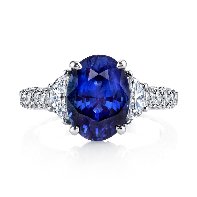 Manfredi Jewels Engagement - Oval Blue Sapphire 4.39ct Three-Stone Ring with Half-Moon Diamond Side Stones and Triple-Row Micro Pavé Band