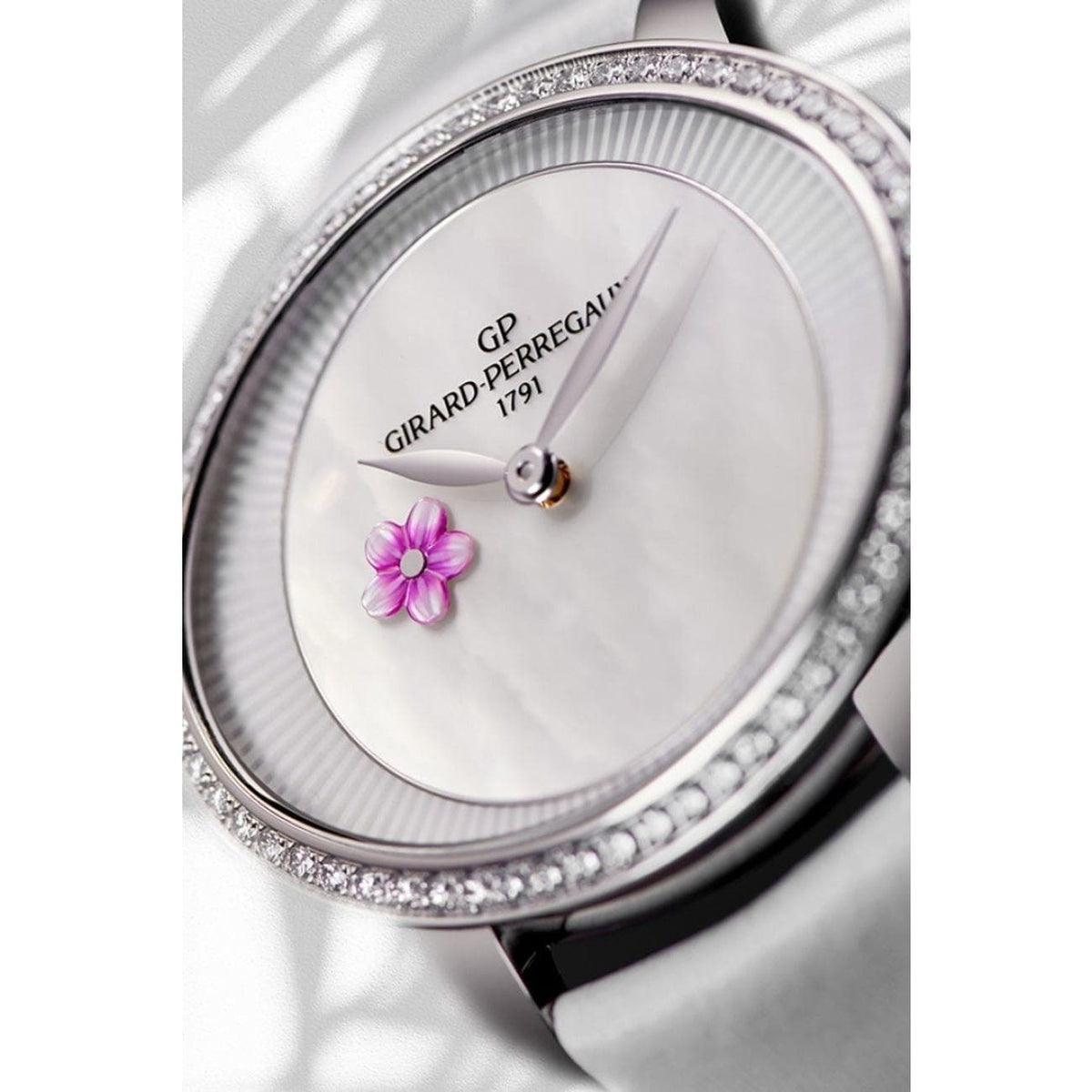 Girard-Perregaux New Watches - CAT’S EYE PLUM BLOSSUM | Manfredi Jewels
