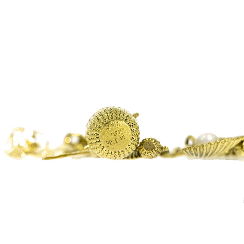 Estate Jewelry - 18K Yellow Gold Diana Kim England Charm Bracelet with 18 charms | Manfredi Jewels