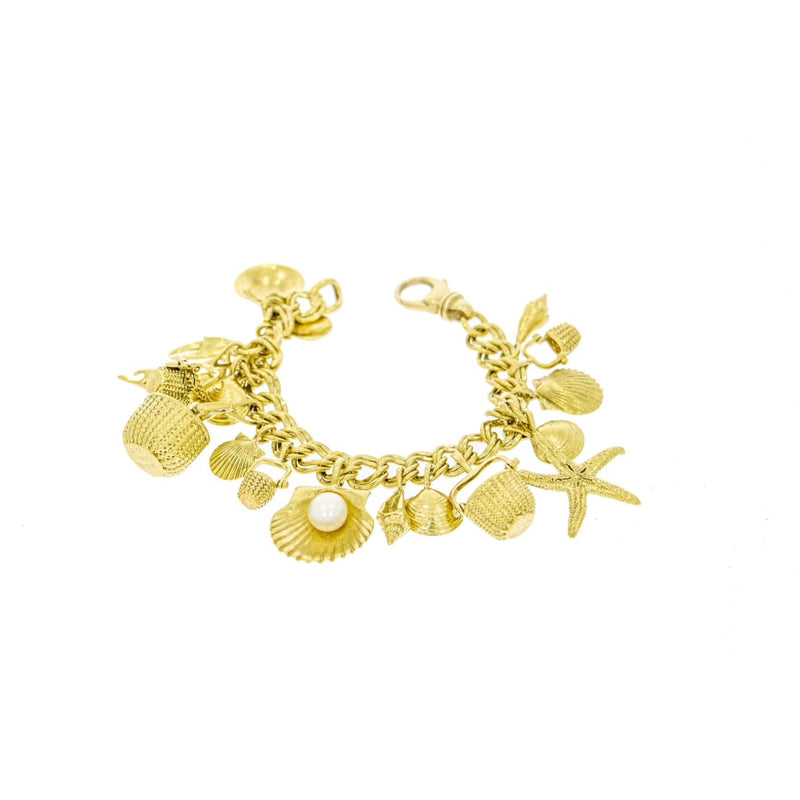 Estate Jewelry - 18K Yellow Gold Diana Kim England Charm Bracelet with 18 charms | Manfredi Jewels