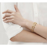 Estate Jewelry - Tiffany & Co. Jean Schlumberger ’X’ 18K Yellow Gold Bracelet | Manfredi Jewels