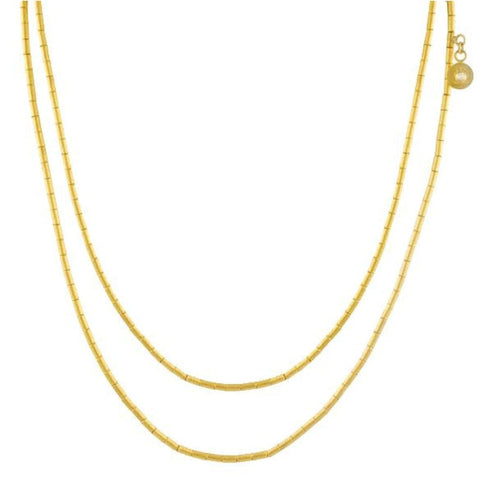 Single strand vertigo with hollow sleet beads necklace