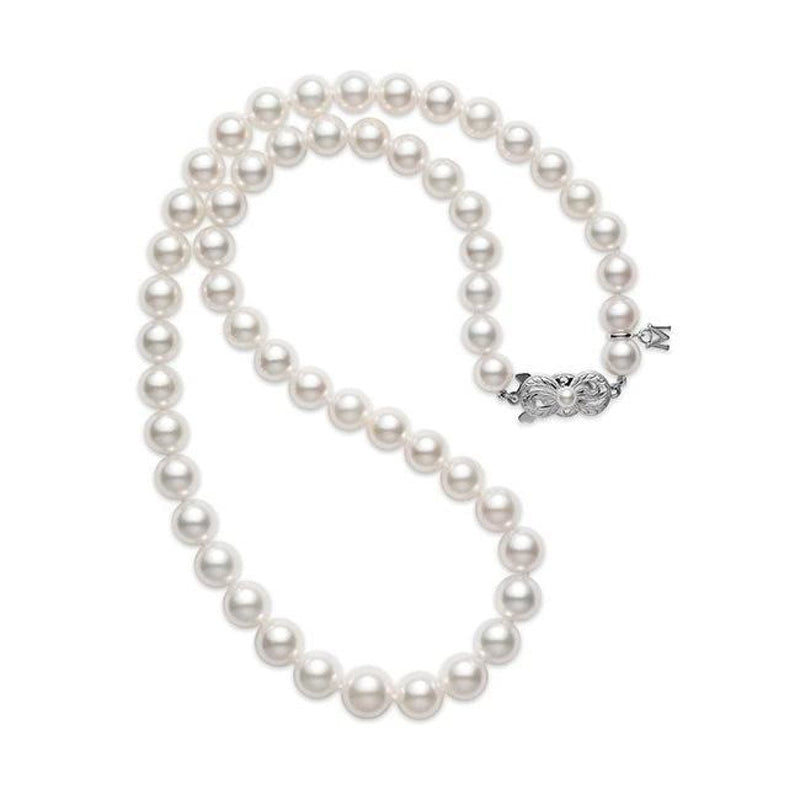 PEARL NECKLACE, cultured pearls, clasp in 18k white gold, blue gemstone,  bordered by white gemstones. Jewellery & Gemstones - Necklace - Auctionet