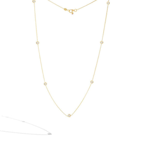 18K NECKLACE WITH 7 DIAMOND STATIONS